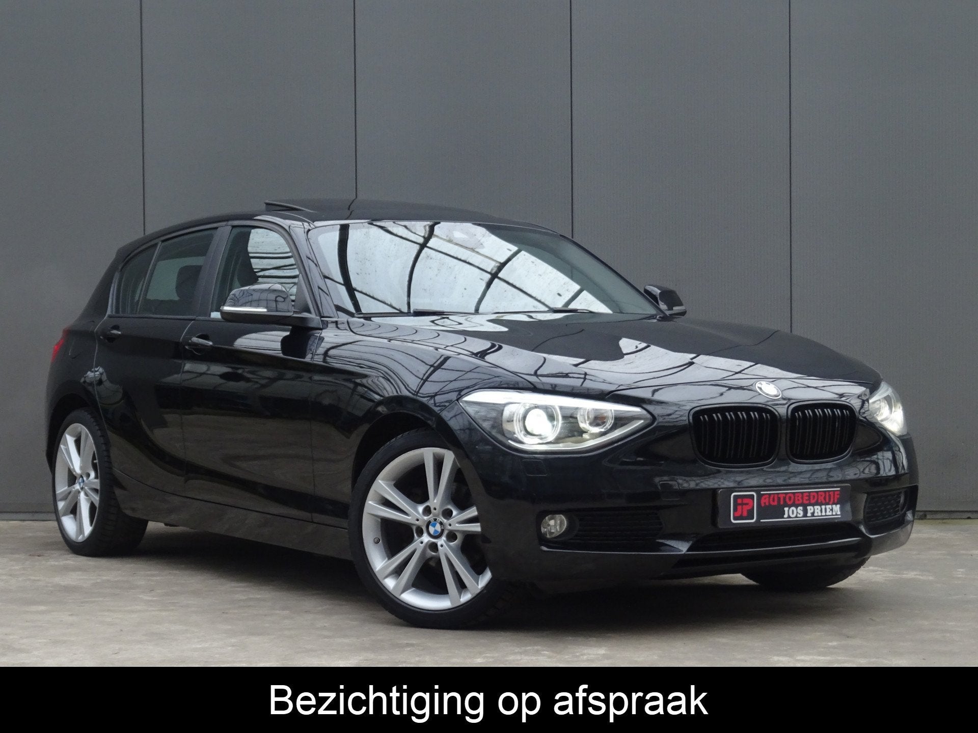BMW 1-serie 116i Limited Edition * OPEN DAK * PDC * GR NAVIG, Auto's, Euro 5, Gebruikt, 4 cilinders, Zwart