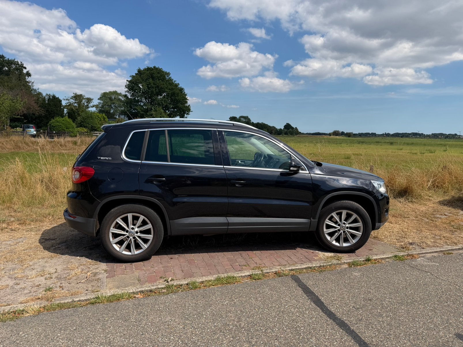 Volkswagen Tiguan 1.4 TSI 110KW 4MOTION 2010 Zwart, Auto's, 13 km/l, Stof, Zwart, 4 cilinders