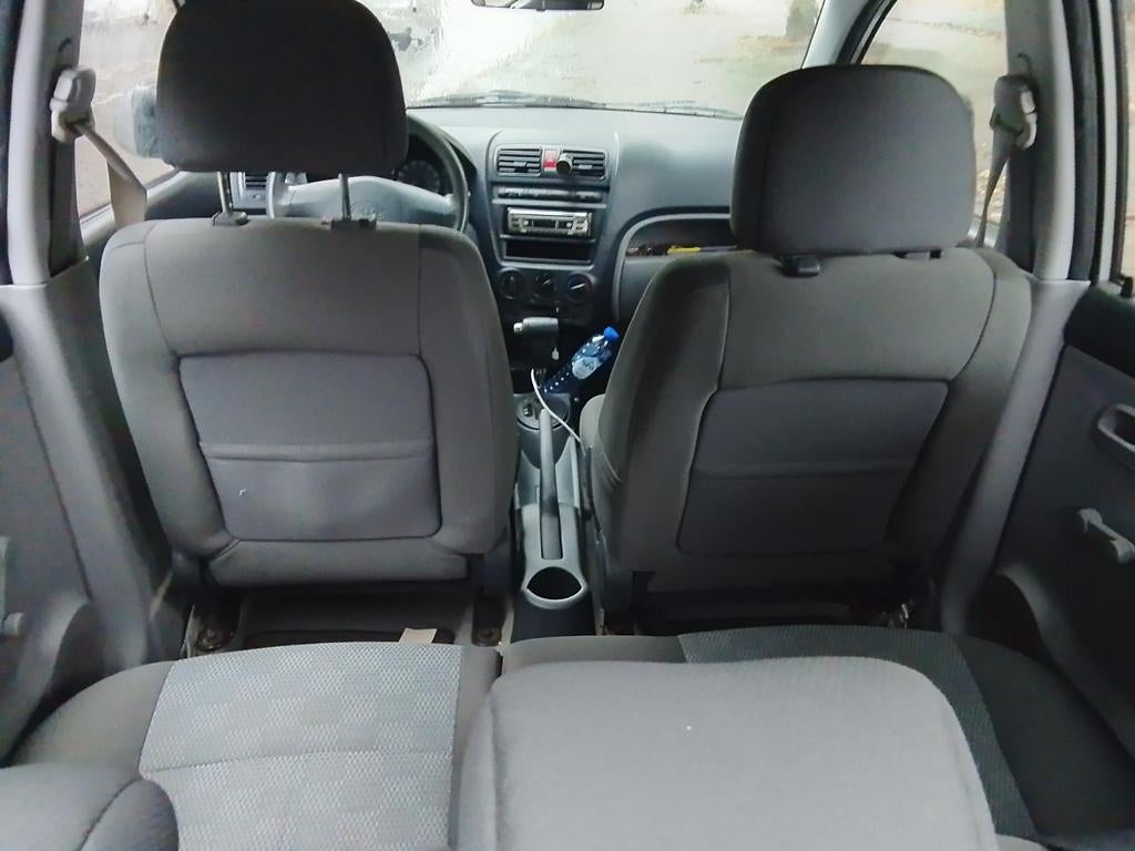 Kia Picanto 1.1 AUT 2006 Grijs, Auto's, Kia, Stof, 4 cilinders, Origineel Nederlands, 400 kg