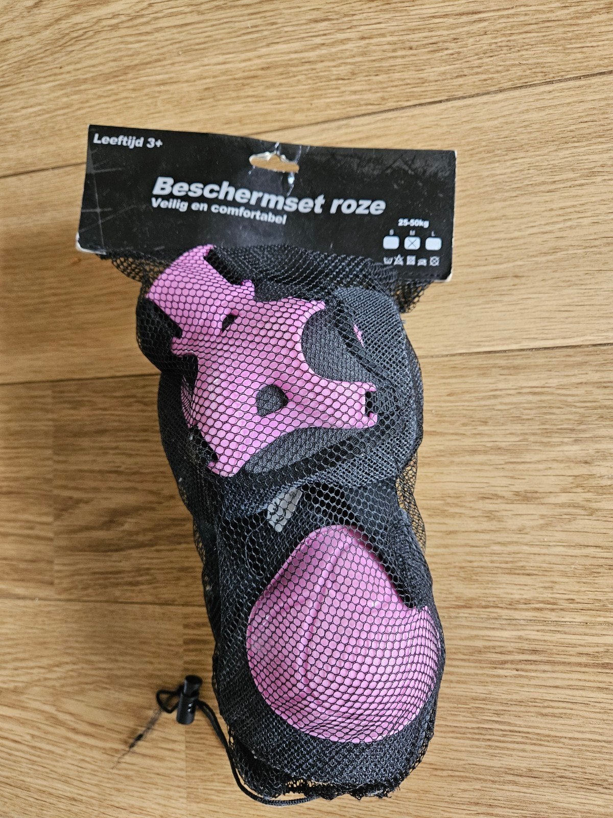Beschermset roze (bvb voor skaten), Ophalen