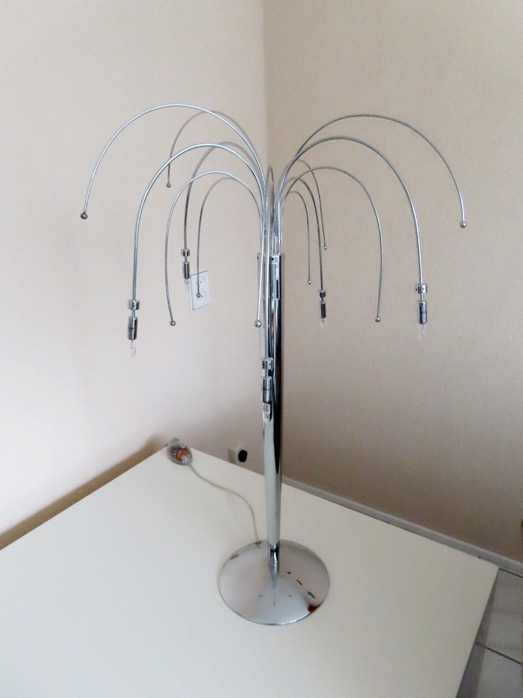 zilverkleurige tafellamp, Ophalen