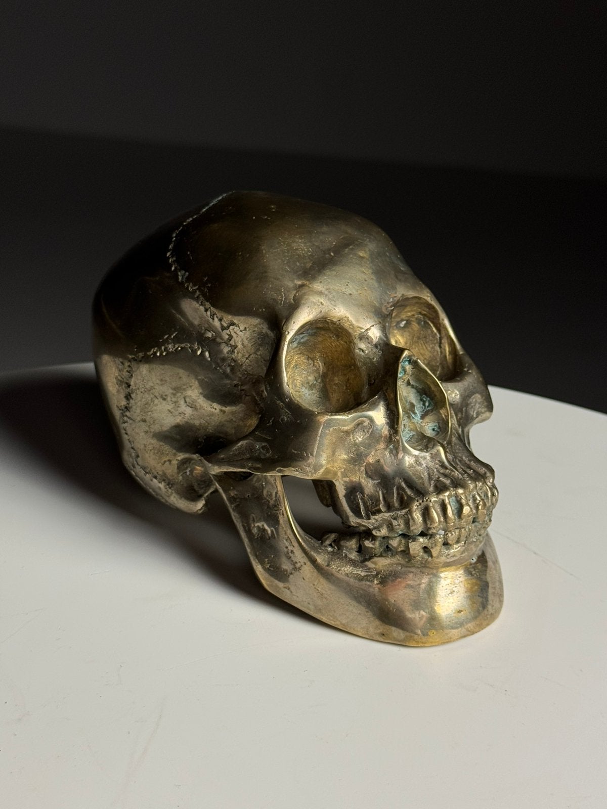 Bronzen schedel memento mori 20e eeuw, Ophalen