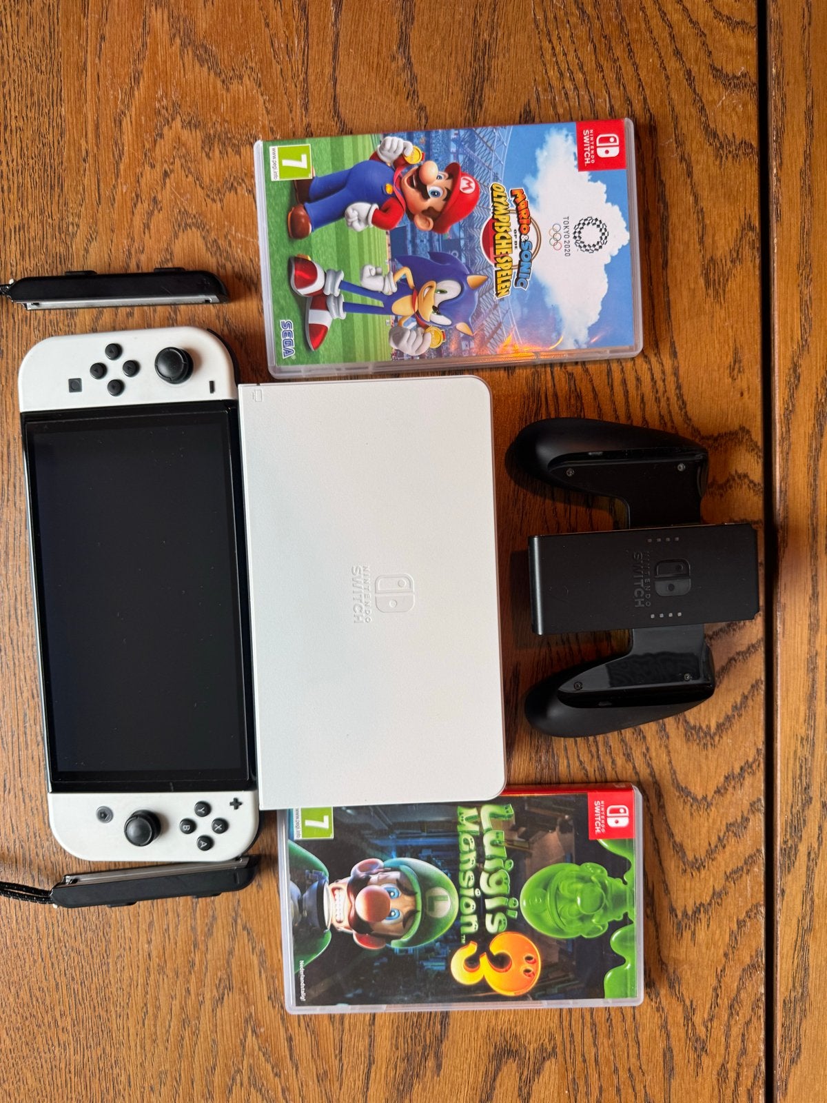 Nintendo Switch OLED met 2 games en accessoires, Switch OLED, Met games, Met 2 controllers, Ophalen of Verzenden