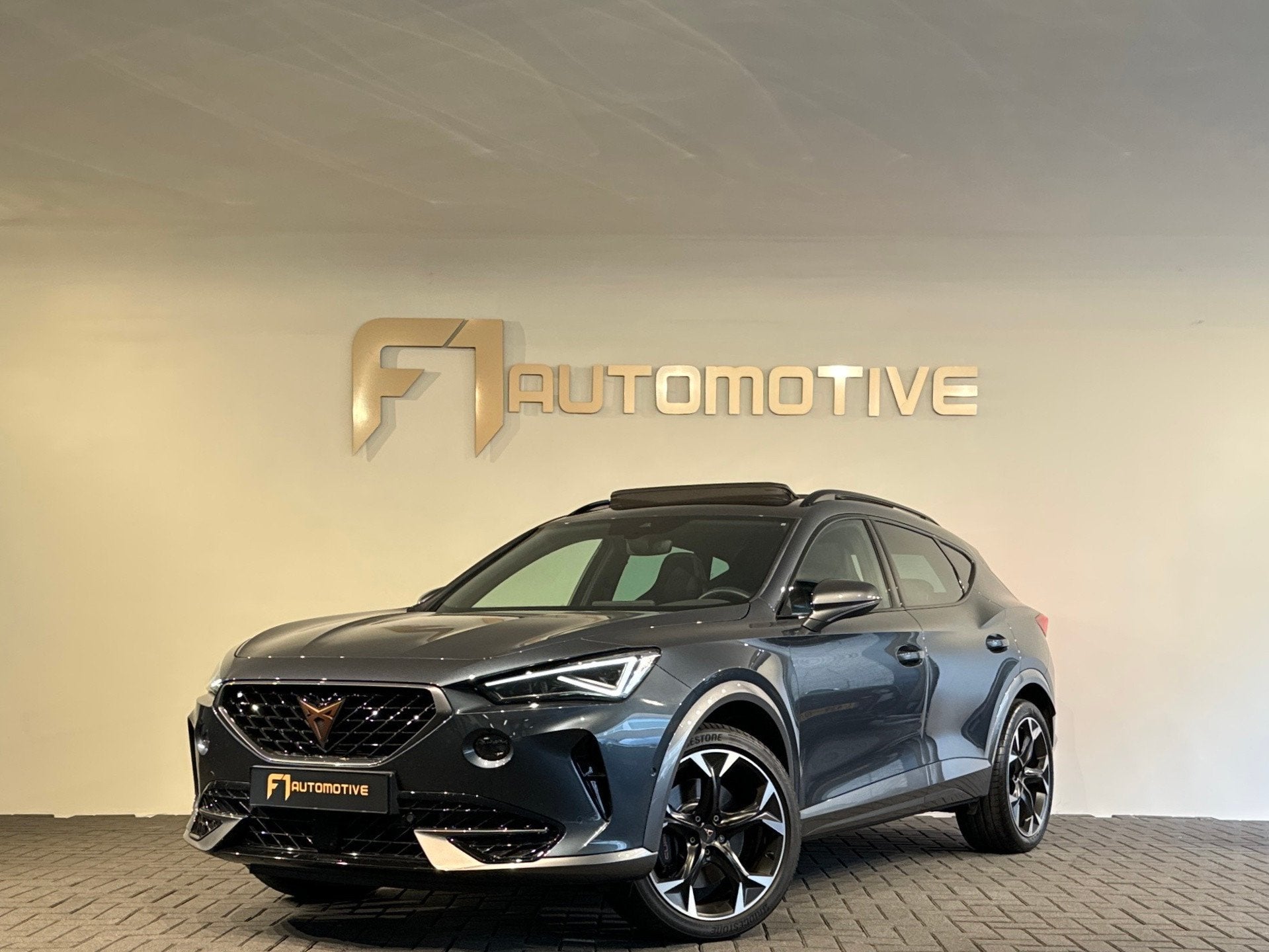 Cupra FORMENTOR 2.0 TSI 4DRIVE Pano|Kuipstoelen|Beats|Sfeerv, Auto's, Dealer onderhouden, Euro 6, 4 cilinders, Leder en Stof