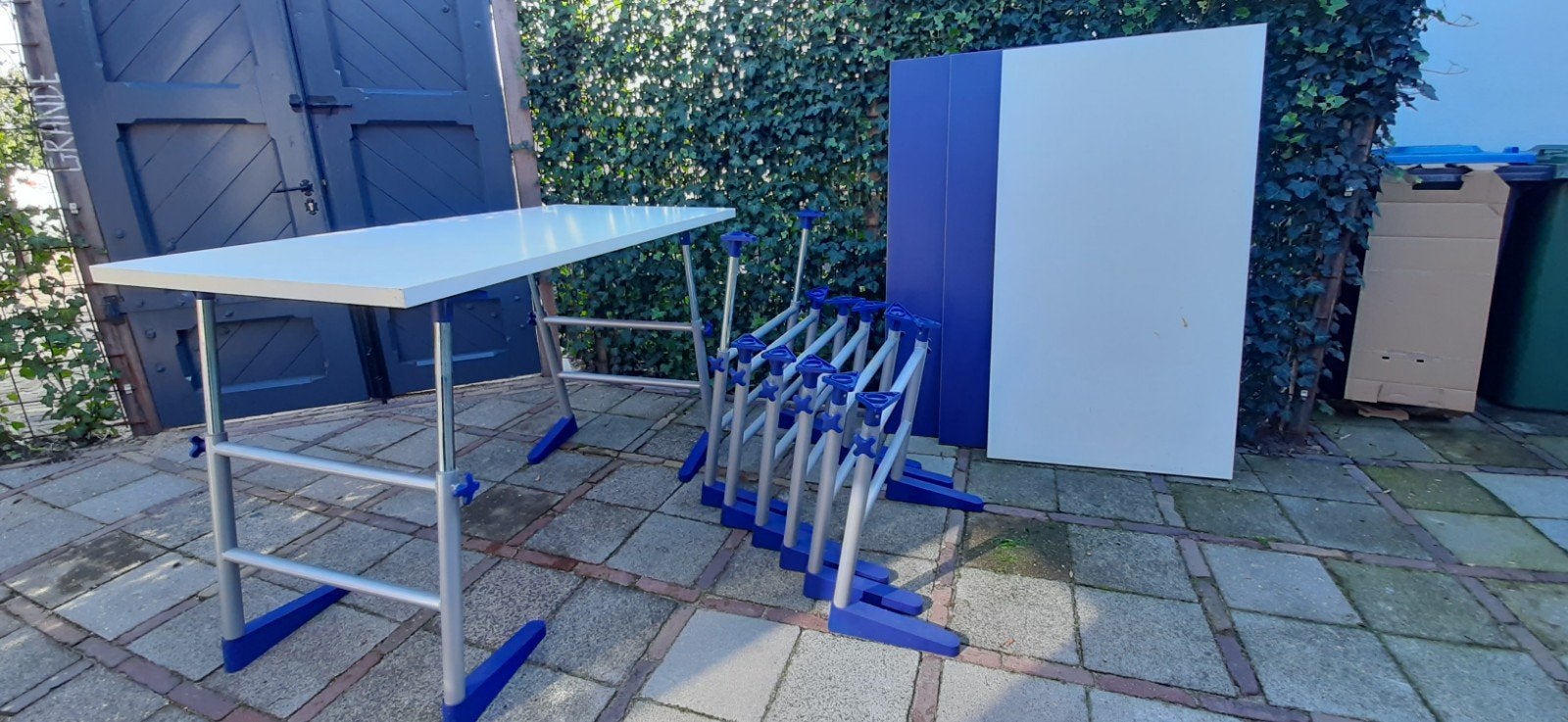 4 in hoogte verstelbare tafels met metalen onderstel, Ophalen, Gebruikt, 100 tot 150 cm, 50 tot 100 cm
