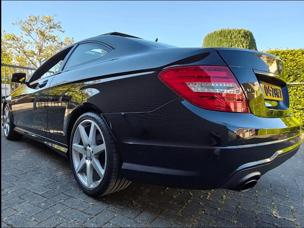 Mercedes C180 Coupé AMG Line  2012 original (NL), Auto's, 745 kg, Achterwielaandrijving, 1800 kg, Zwart