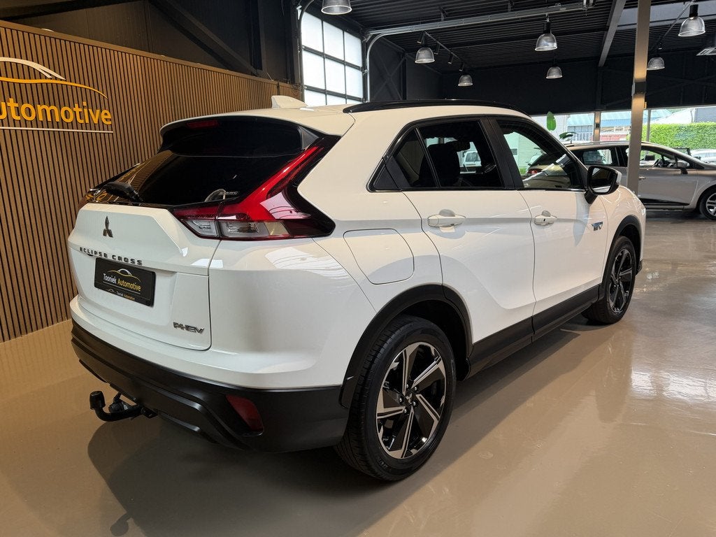 Mitsubishi Eclipse Cross 2.4 PHEV Instyle Adaptive Cruise co, Auto's, Mitsubishi, Automaat, 4 cilinders, Met garantie (alle), Wit