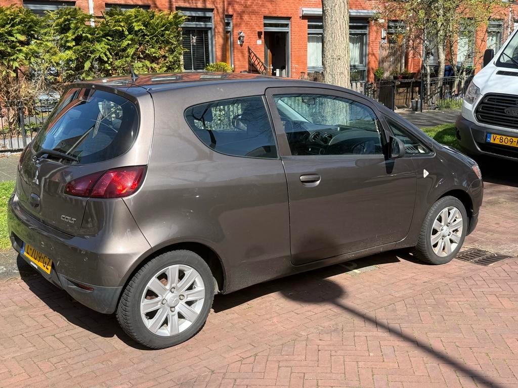 Mitsubishi Colt 1.1 3-DR 2011 Bruin, Auto's, Mitsubishi, Voorwielaandrijving, 74 pk, Bruin, Colt