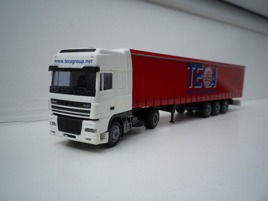 AWM Daf XF105 schuifzeiltrailer TECA, Hobby en Vrije tijd, Modelauto's | 1:87, Ophalen of Verzenden, Zo goed als nieuw, Bus of Vrachtwagen