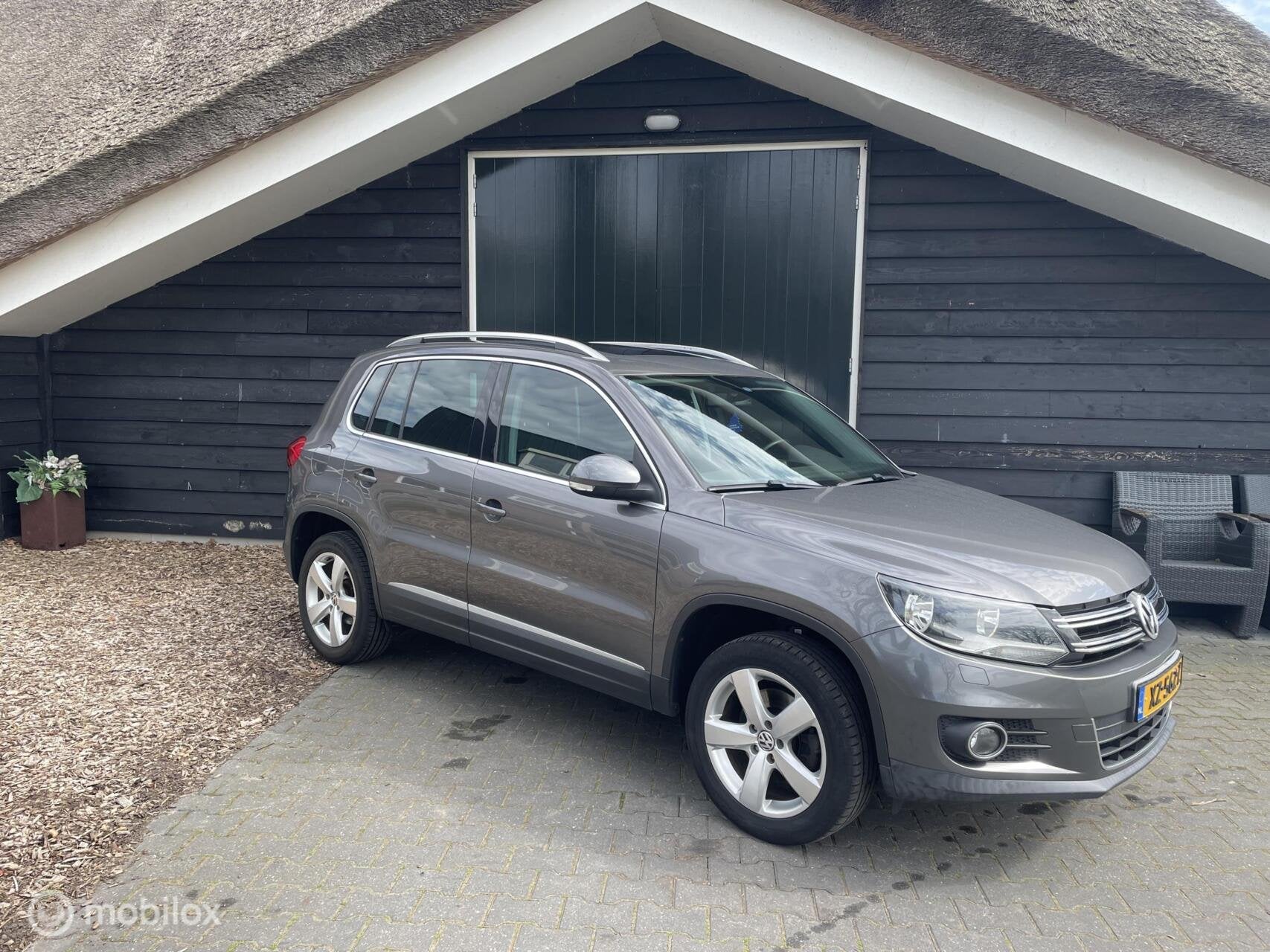 Volkswagen Tiguan 1.4 TSI Sport&Style, Panoramadak, Airco, Auto's, Voorwielaandrijving, Euro 5, Gebruikt, Zwart