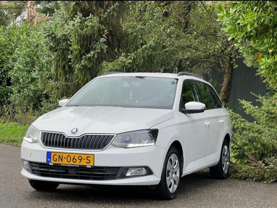 Skoda Fabia 1.4TDI 66KW Combi 2015 Wit, Auto's, Skoda, Voorwielaandrijving, Wit, Origineel Nederlands, Stationwagon