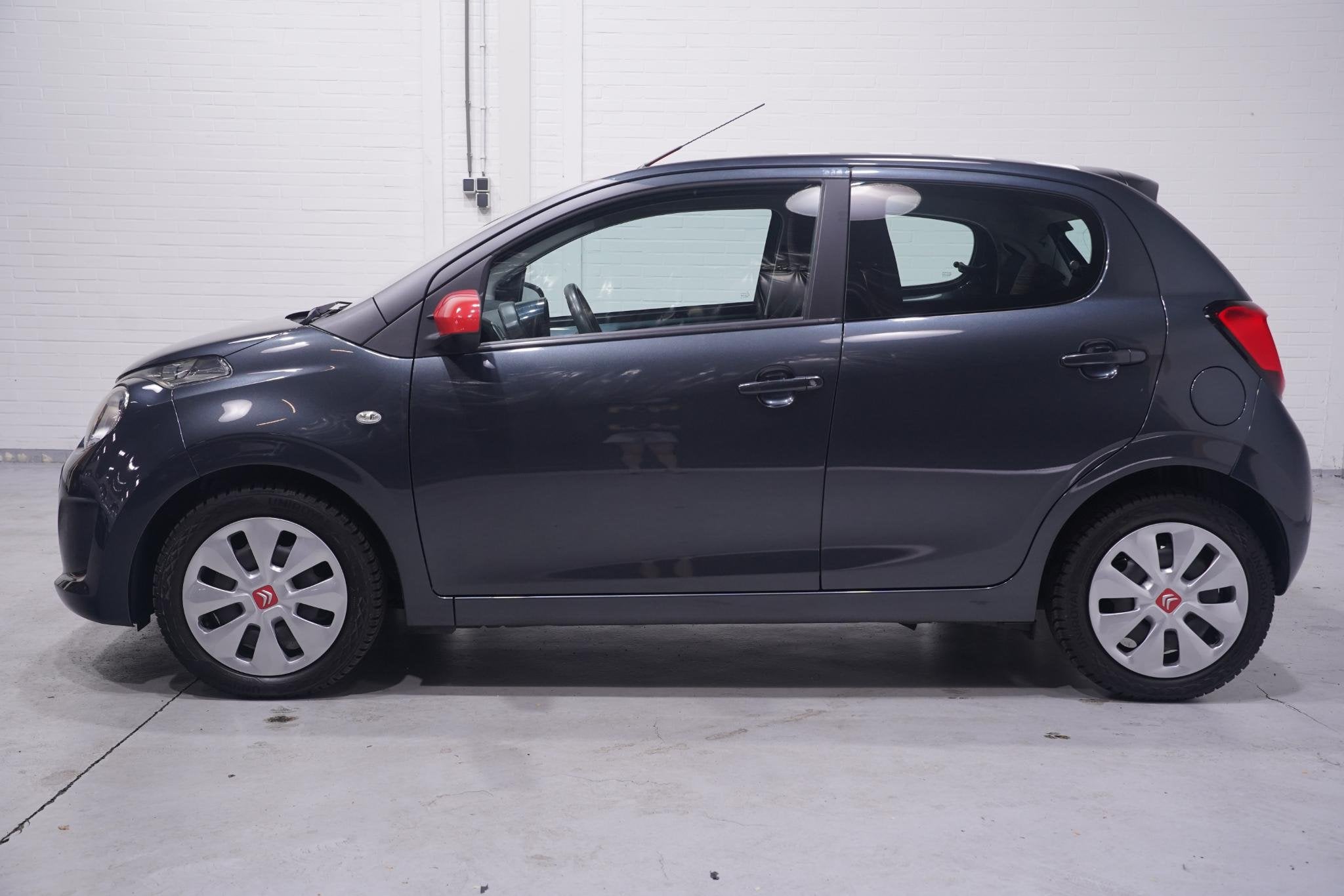 Citroen C1 1.2 PureTech Shine airco bleutooth stuurbediening, Auto's, Voorwielaandrijving, Stof, Gebruikt, Euro 6