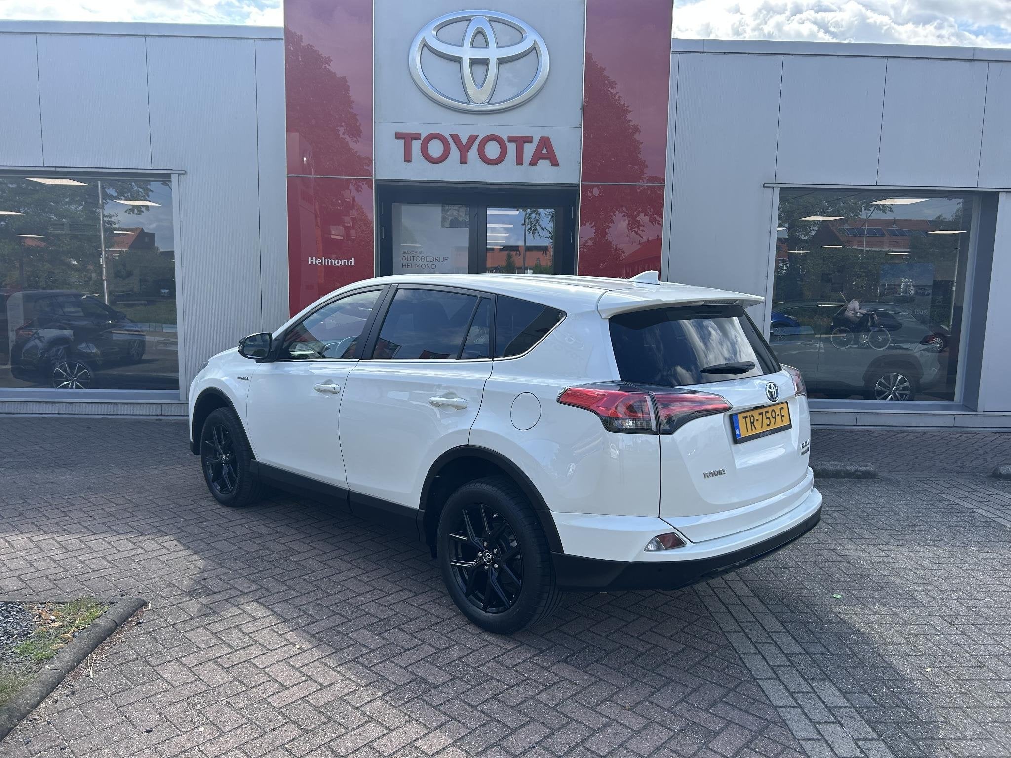 Toyota RAV4 2.5 Hybrid Black Edition Schuif-/kanteldak | AUT, Auto's, Toyota, Gebruikt, Euro 6, Wit, Hybride Elektrisch/Benzine