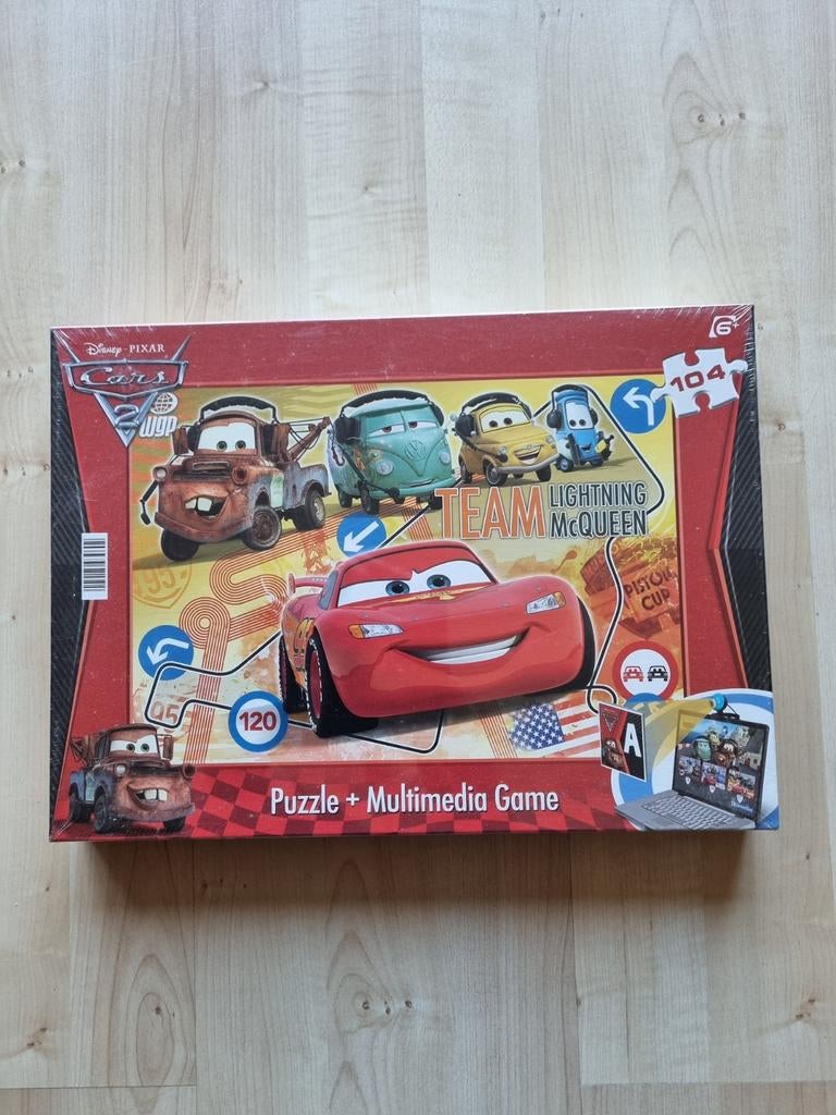 Disney Cars 2 puzzel -104 stukjes - Nieuw in folie, Ophalen of Verzenden, Meer dan 50 stukjes, Nieuw, 4 tot 6 jaar