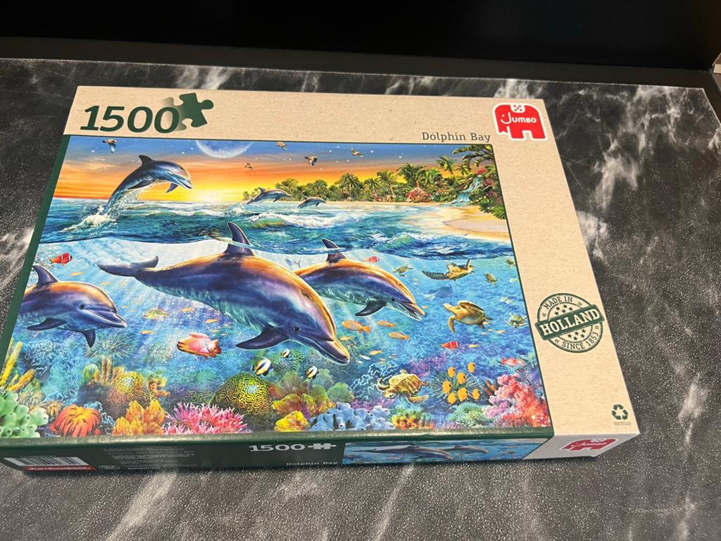 Jumbo puzzel 1500 stukjes Dolfijnenbaai, Ophalen of Verzenden, 500 t/m 1500 stukjes, Zo goed als nieuw