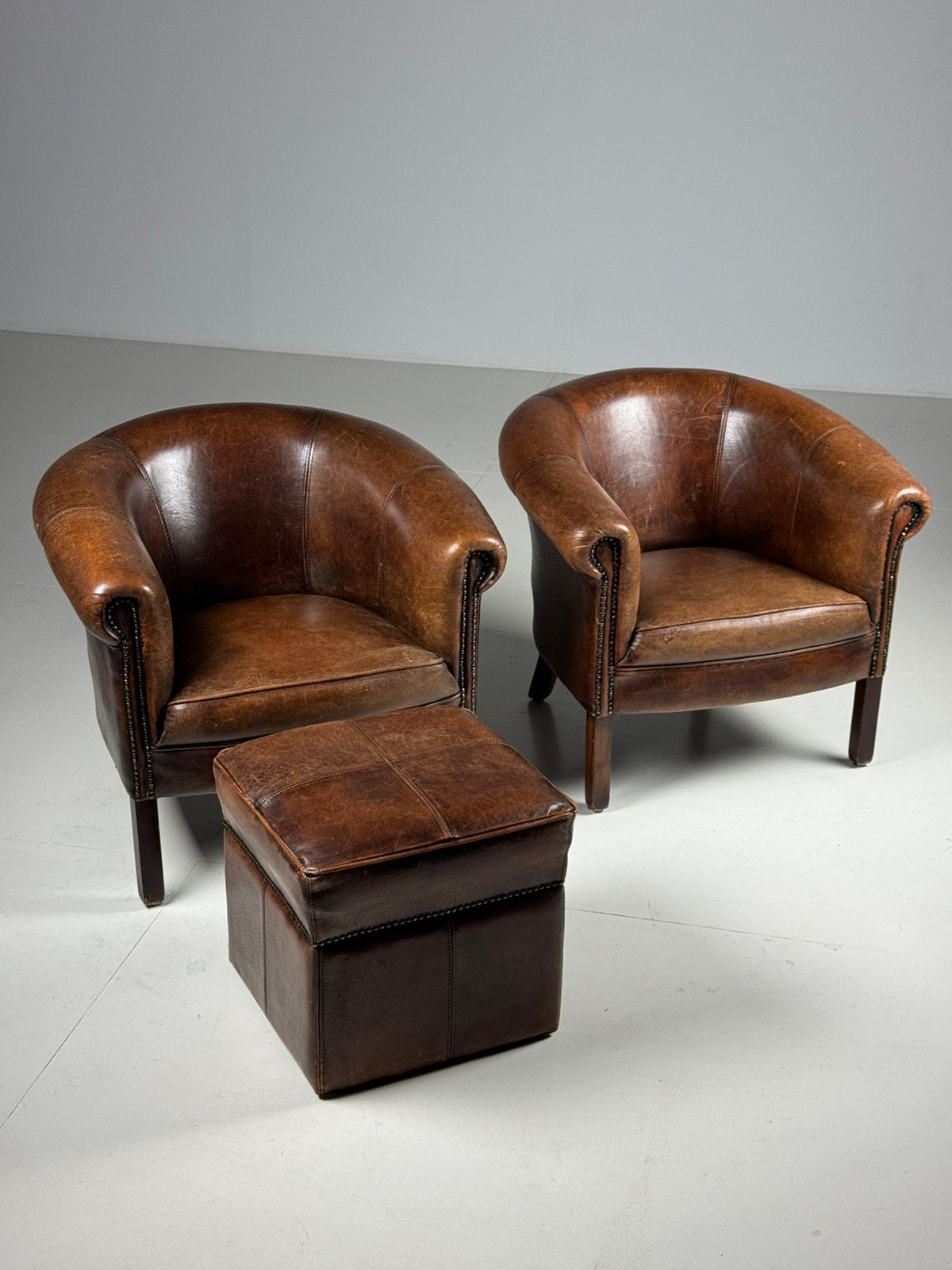 Set van 2 schapenleren clubfauteuils leder
