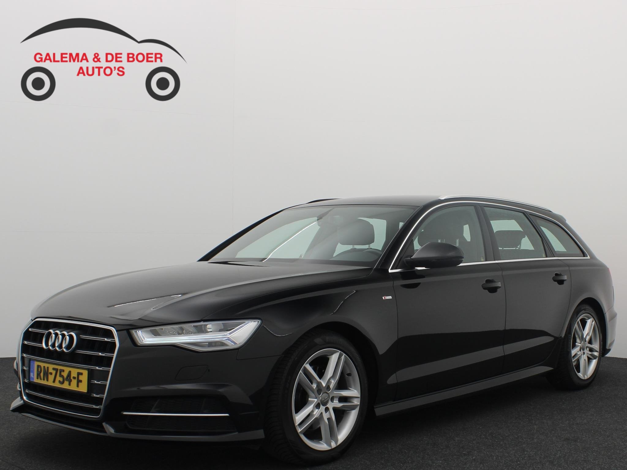 Audi A6 Avant 1.8 TFSI ultra S line Edition AUTOMAAT / TREKH, Auto's, Leder en Stof, Zwart, Origineel Nederlands, 93 €/maand