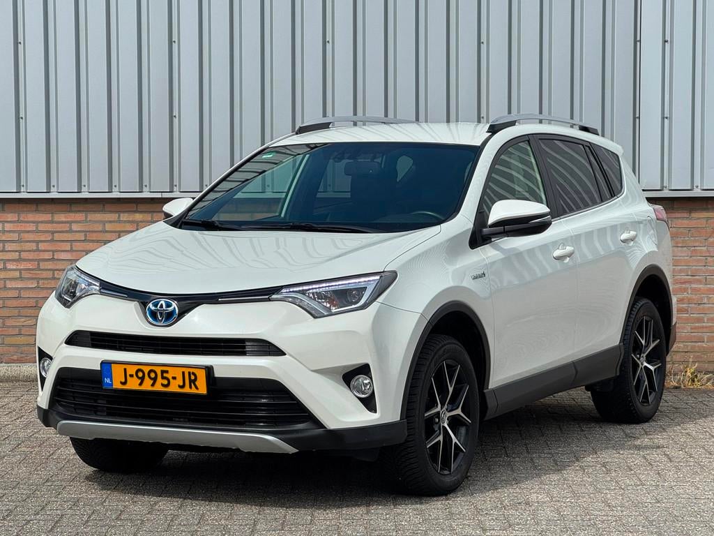Toyota RAV4 2.5 Hybrid Style Dealer onderhouden, Gebruikt, Leder en Stof, Wit, Bedrijf