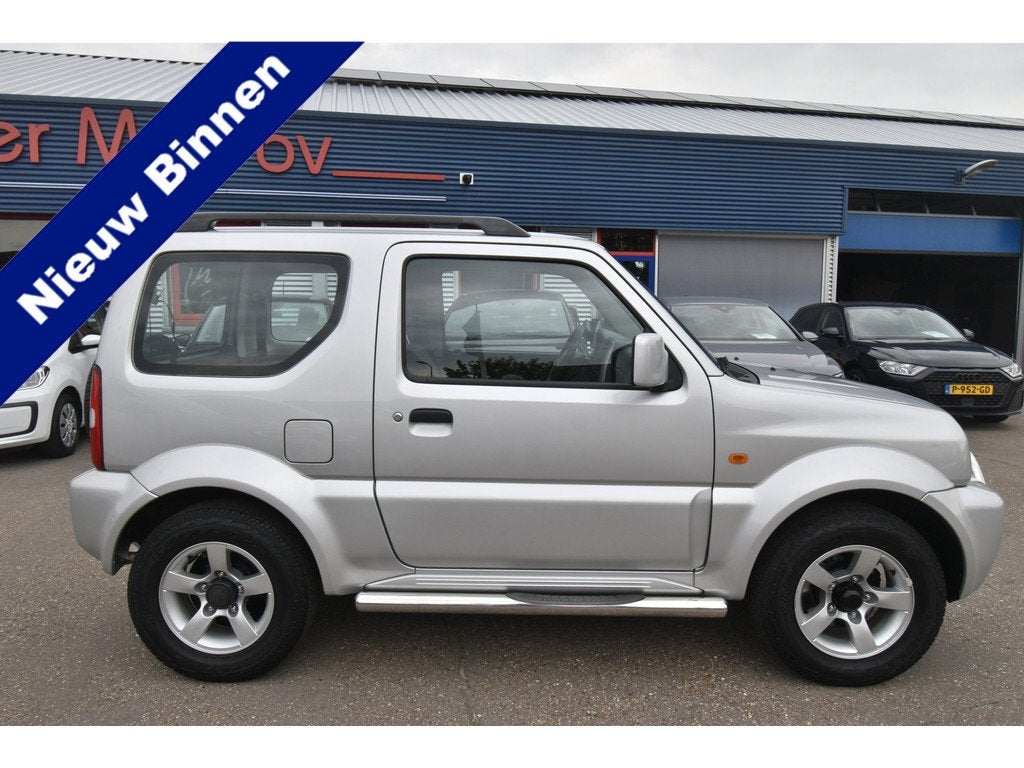 Suzuki Jimny 1.3 Exclusive 4WD , TREKHAAK , AIRCO , LMV15 ,, Auto's, Suzuki, Zwart, 4 stoelen, Bedrijf, Vierwielaandrijving