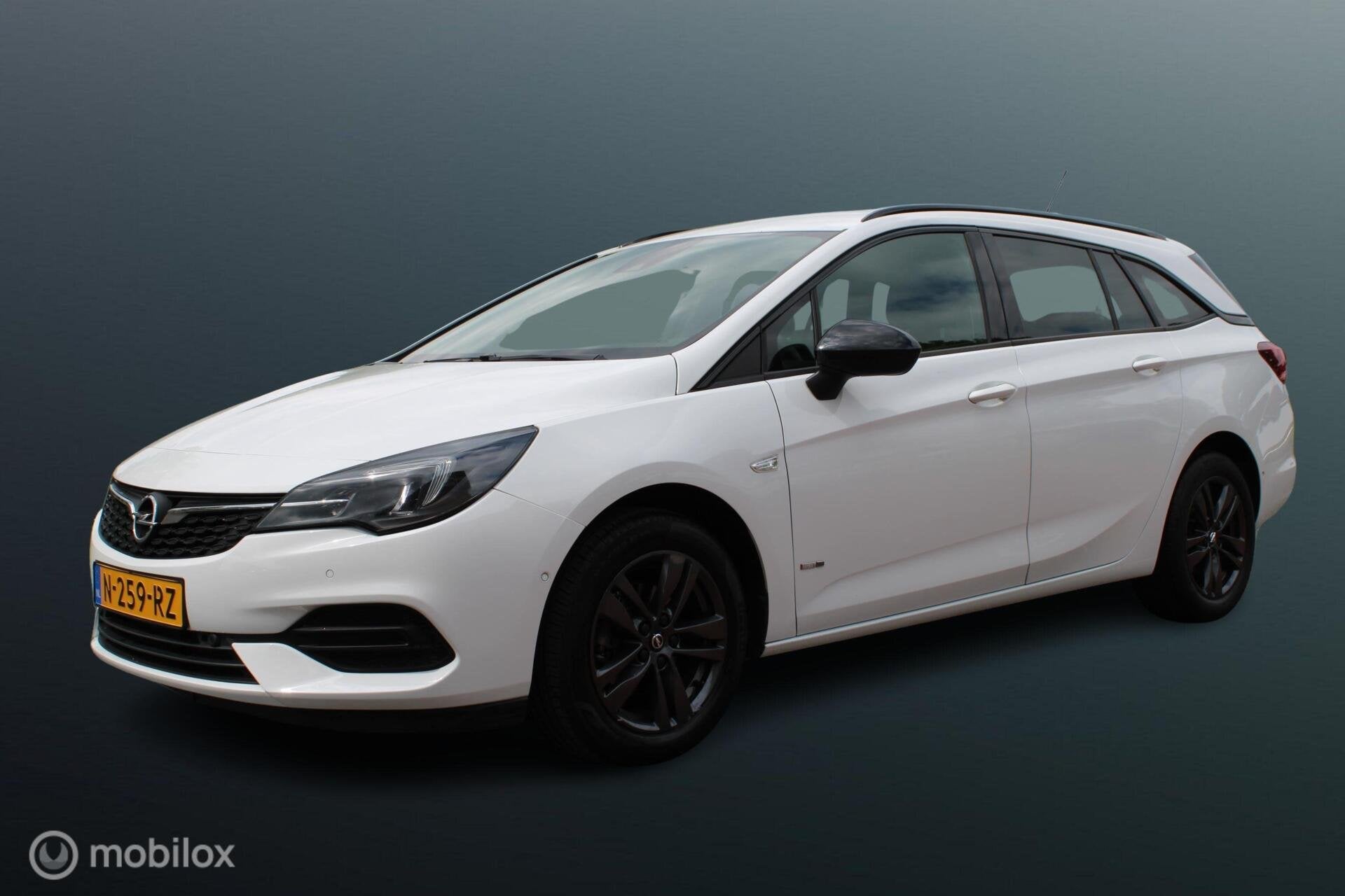 Opel Astra Sports Tourer 1.2 Design & Tech, Camera, Voor + a, Auto's, Voorwielaandrijving, Stof, Gebruikt, Euro 6