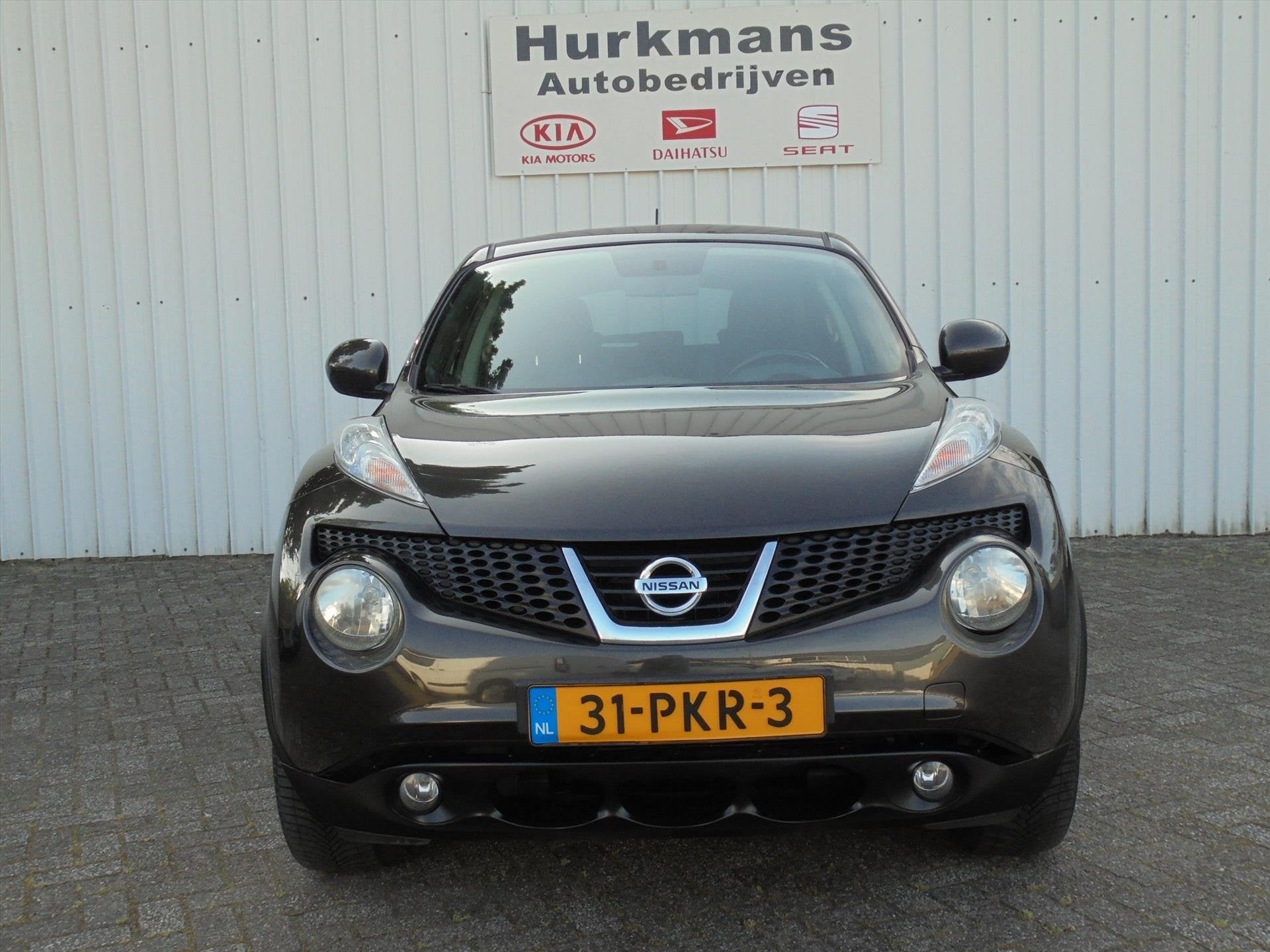 Nissan Juke 1.6 TEKNA 1e EIGENAAR ! NAVI CAMERA ENZ, Auto's, Nissan, Euro 5, Stof, Zwart, 4 cilinders