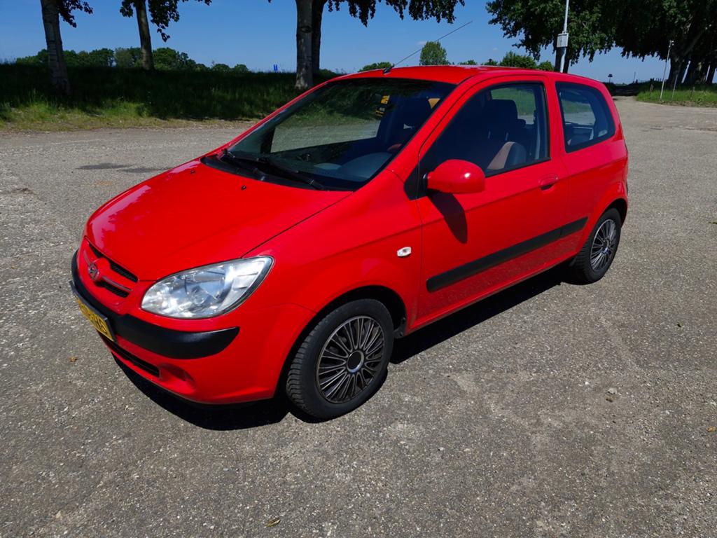 Hyundai Getz 1.1 Ferrari rood, Auto's, Voorwielaandrijving, 31 €/maand, 4 cilinders, Origineel Nederlands