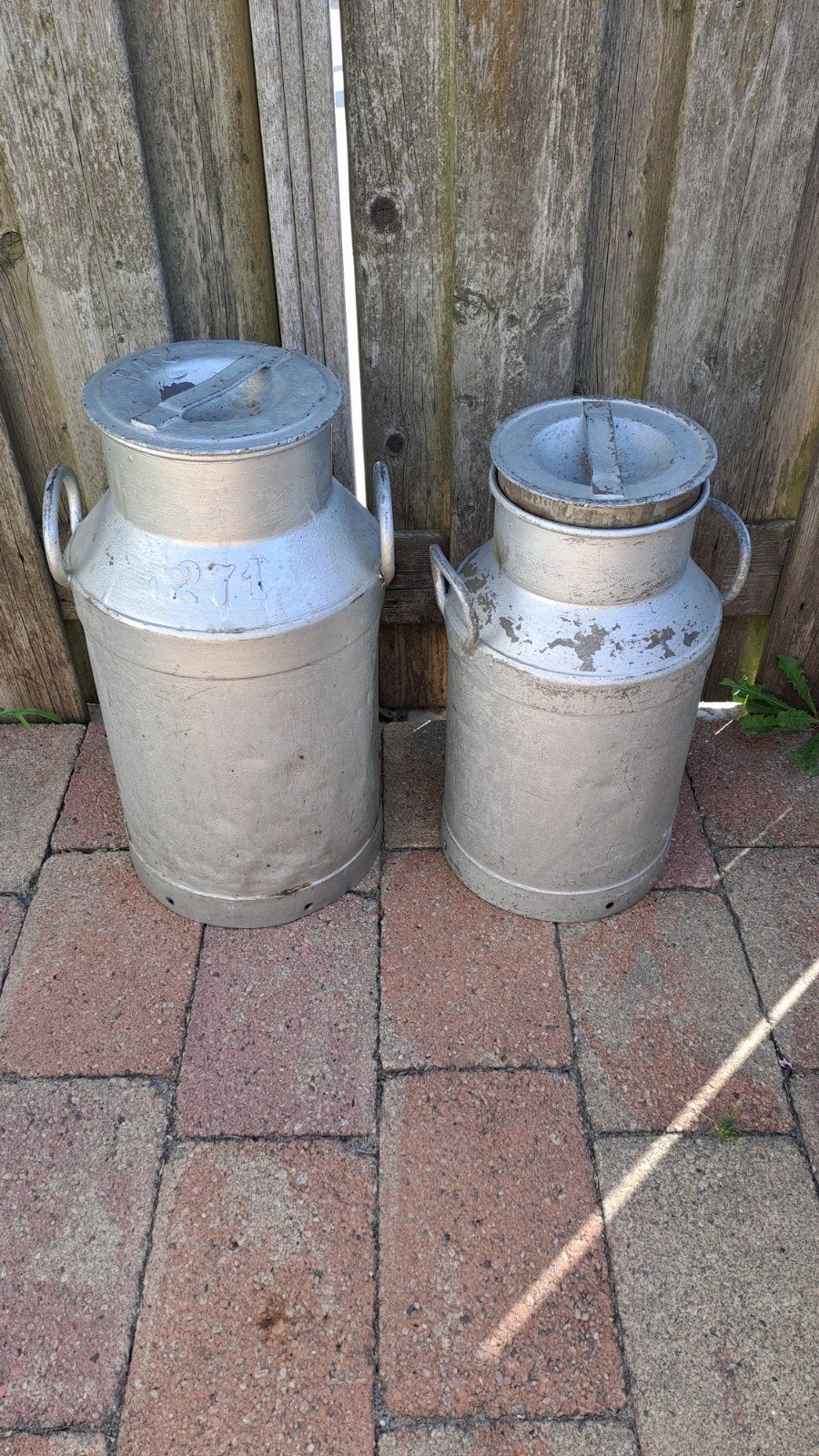 setje melkbussen 57cm en 52 cm hoog, Ophalen