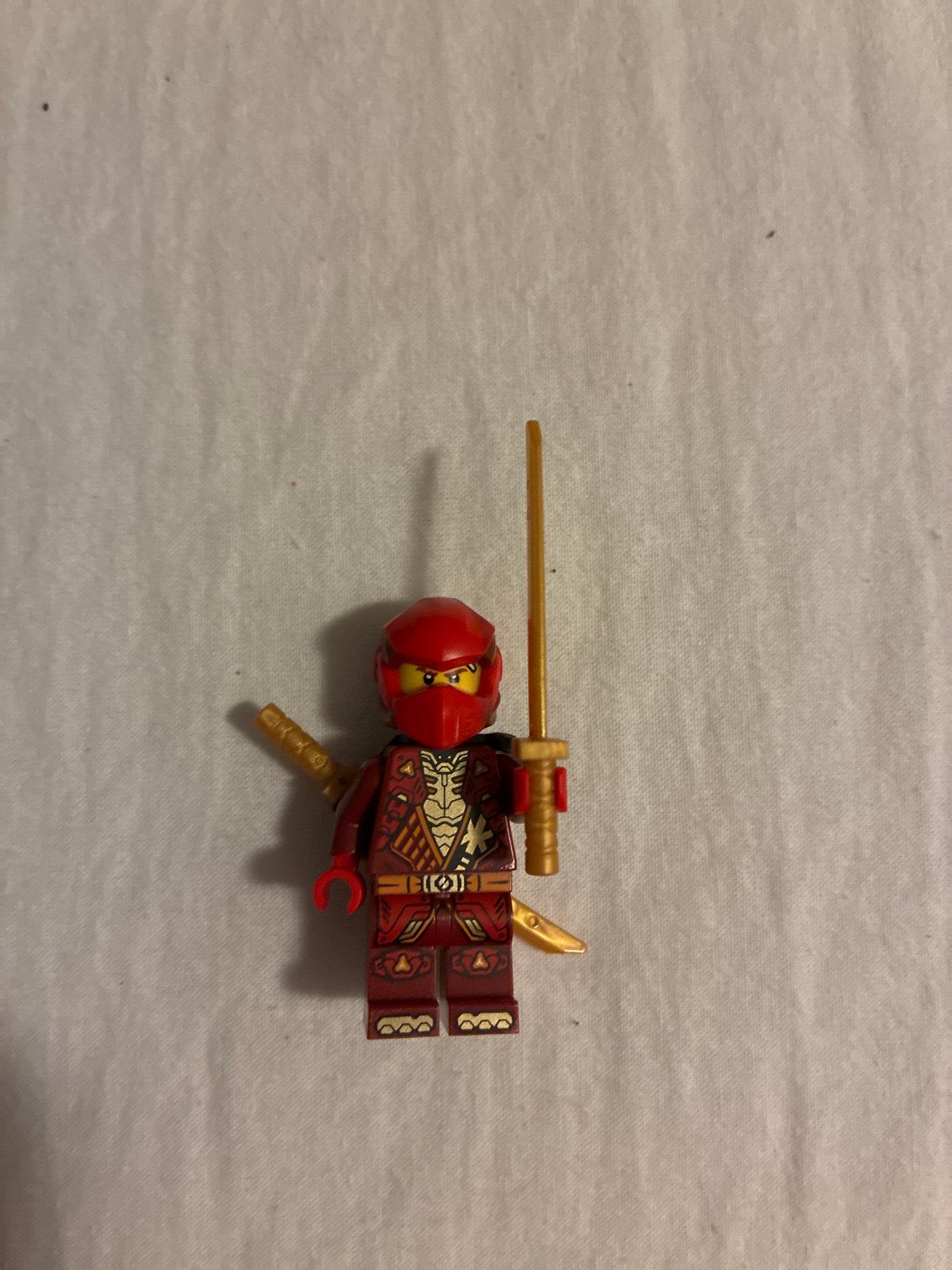 Lego Ninjago Kai Minifiguur met zwaarden, Gebruikt, Lego, Ophalen of Verzenden, Minifiguur