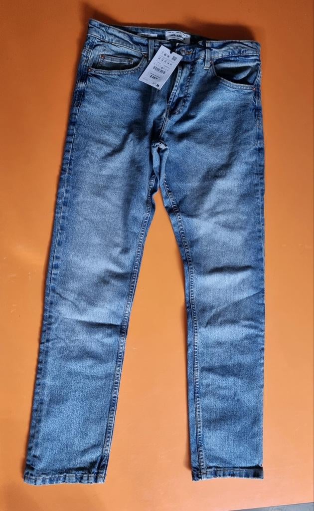 Spijkerbroek pull & bear 34 34 NIEUW  !, Ophalen, Nieuw, Blauw, W27 (confectie 34) of kleiner