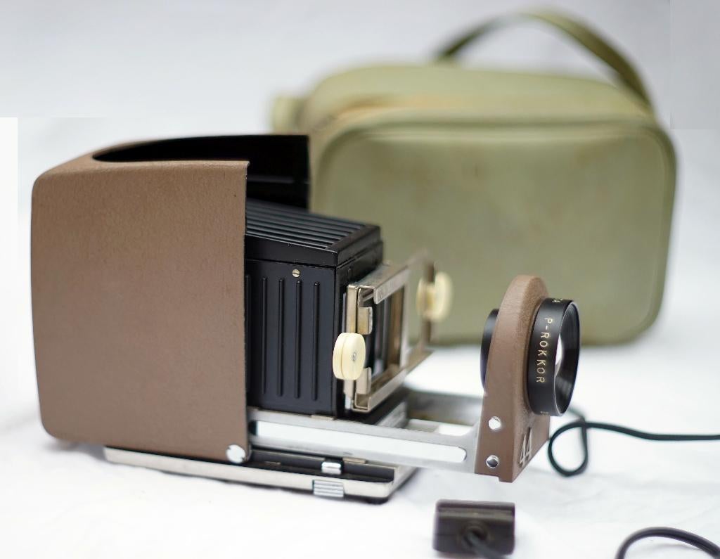 Minolta mini 44 diaprojector met P-Rokkor lens (1958), Ophalen of Verzenden