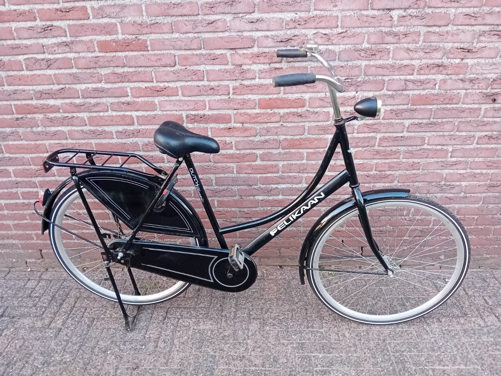 Zwarte omafiets Pelikaan, z.g.a.n. met verlichting, Ophalen, Zo goed als nieuw, Terugtraprem, Pelikaan