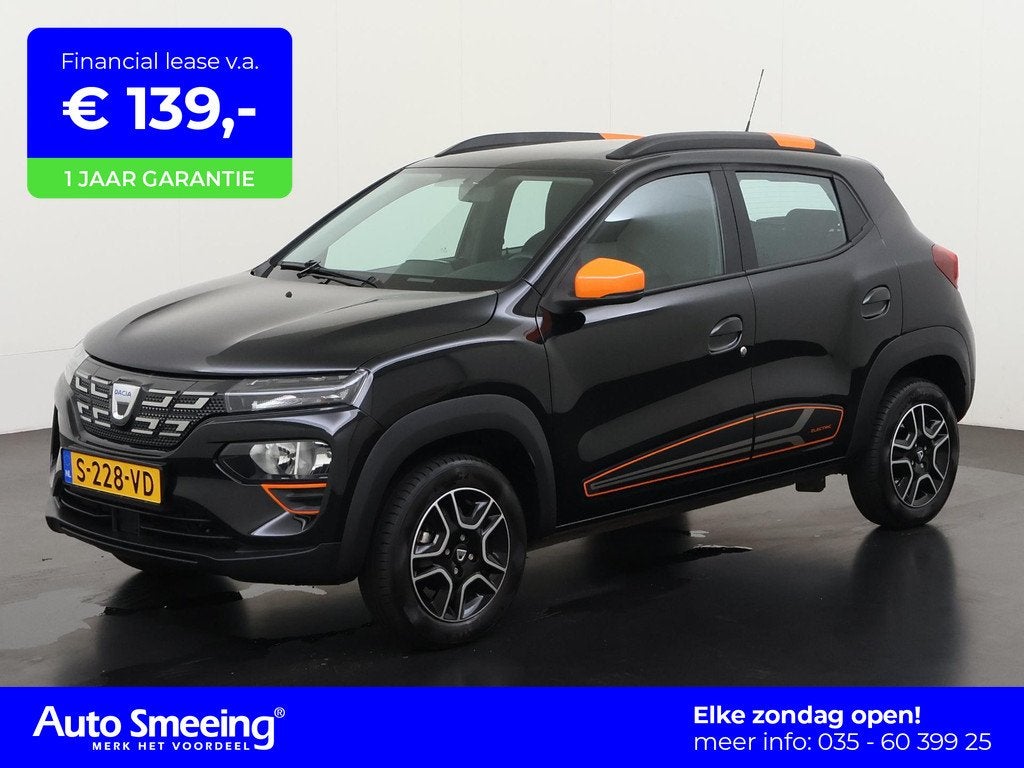 Dacia Spring Comfort Plus 27 kWh | Camera | Carplay | Zondag, Auto's, Dacia, 12 maanden, Gebruikt, Zwart, Parkeersensor