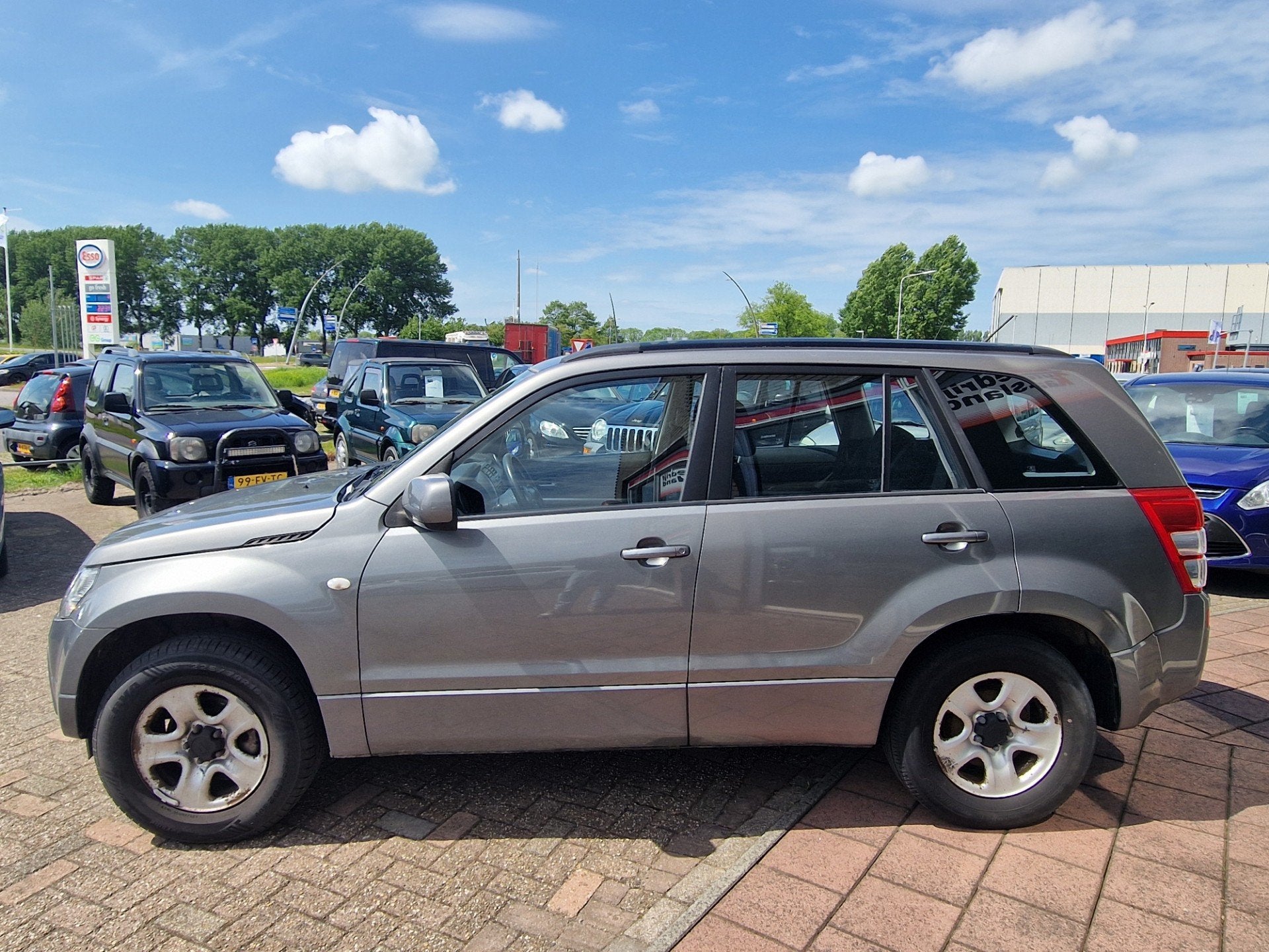 Suzuki Grand Vitara 2.0-16V JLX - Airco - 4x4 -, Auto's, Suzuki, Zwart, 4 cilinders, 1850 kg, Grand Vitara
