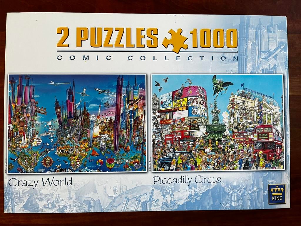 2x cartoon puzzel Picadilly Circus en Crazy World, Ophalen of Verzenden, Meer dan 1500 stukjes, Zo goed als nieuw, Legpuzzel
