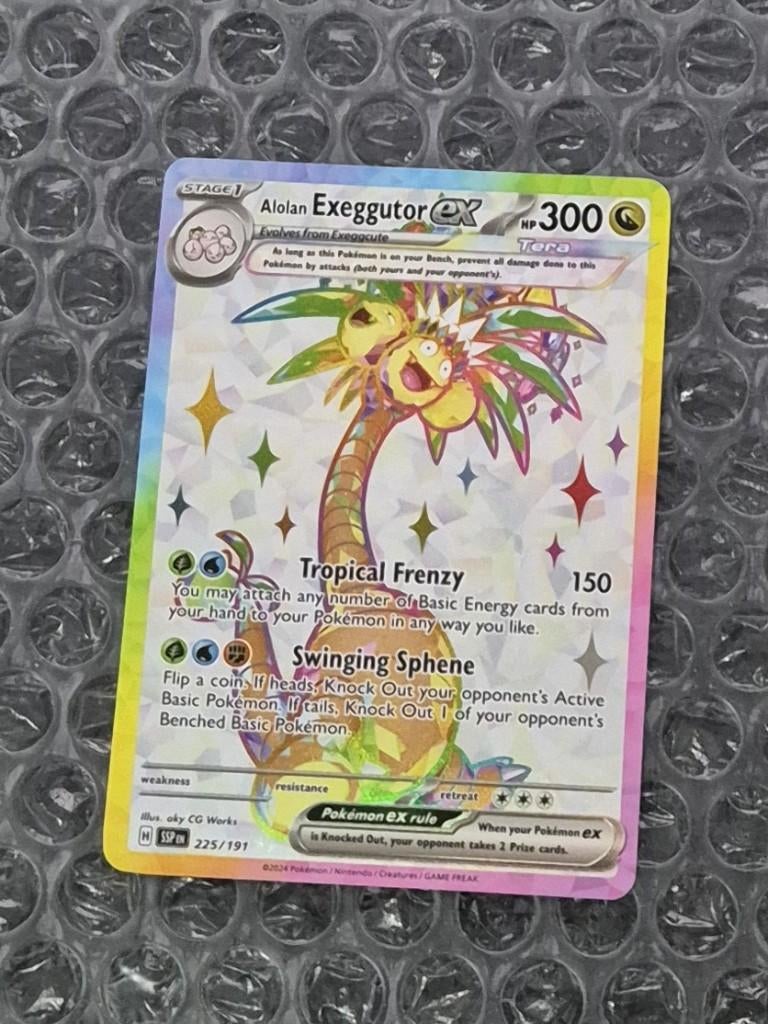 Alolan Exeggutor ex 225/191 Surging Sparks Scarlet & Violet, Ophalen of Verzenden, Zo goed als nieuw, Losse kaart, Foil