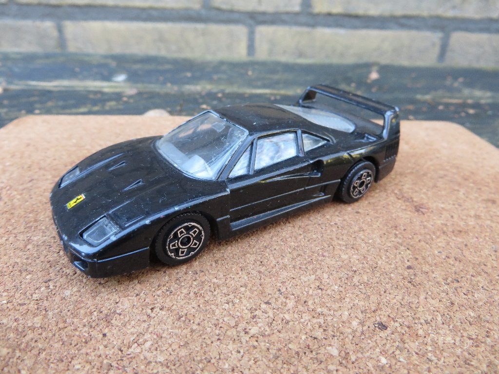 Burago Ferrari F40 ZWART 1:43  Schaal 1:43, Ophalen of Verzenden, Gebruikt, Auto, Overige merken