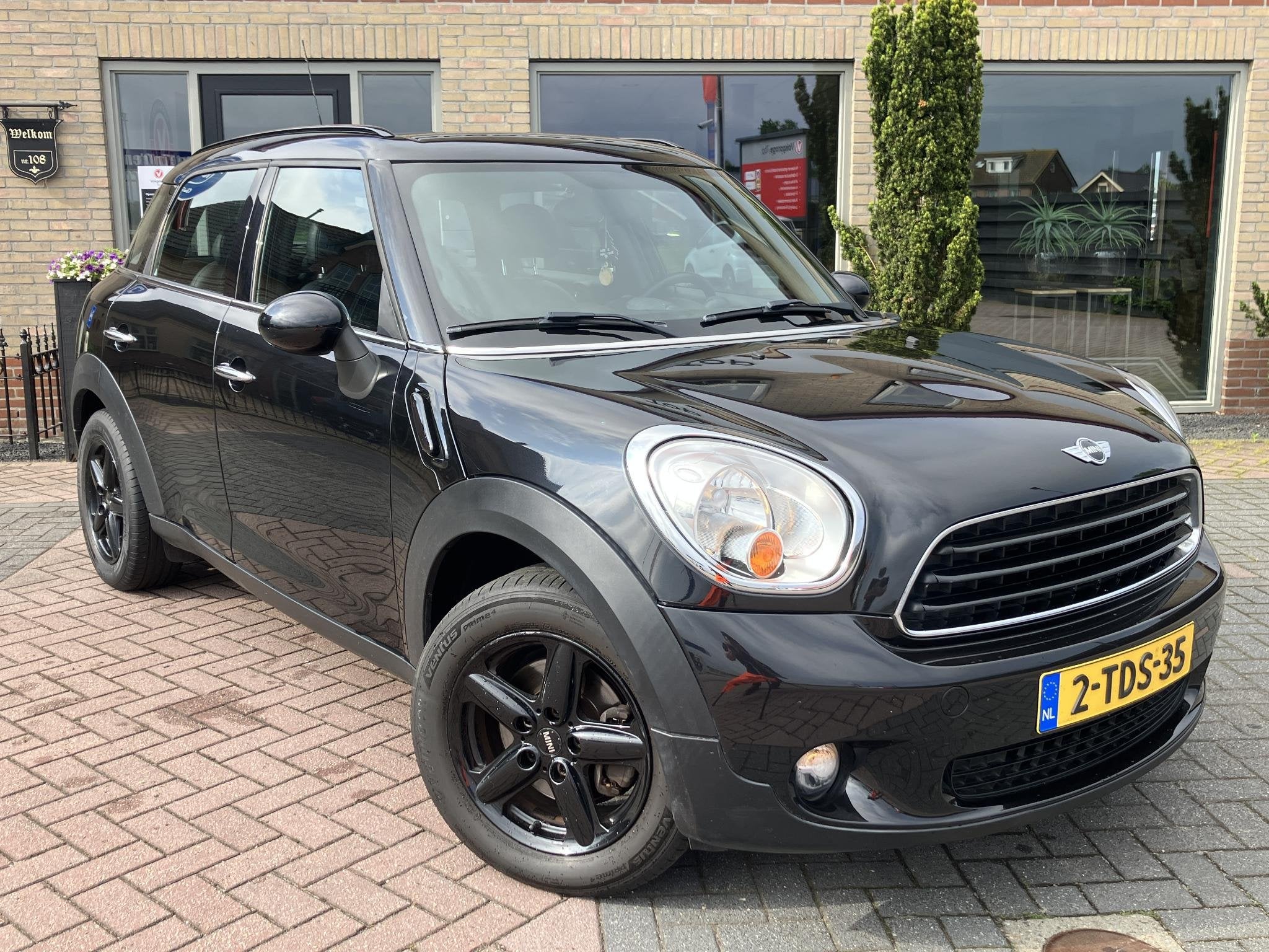 MINI Countryman 1.6 Cooper Business Line | Leder | Navi | NA, Auto's, Euro 5, Gebruikt, Zwart, 1000 kg