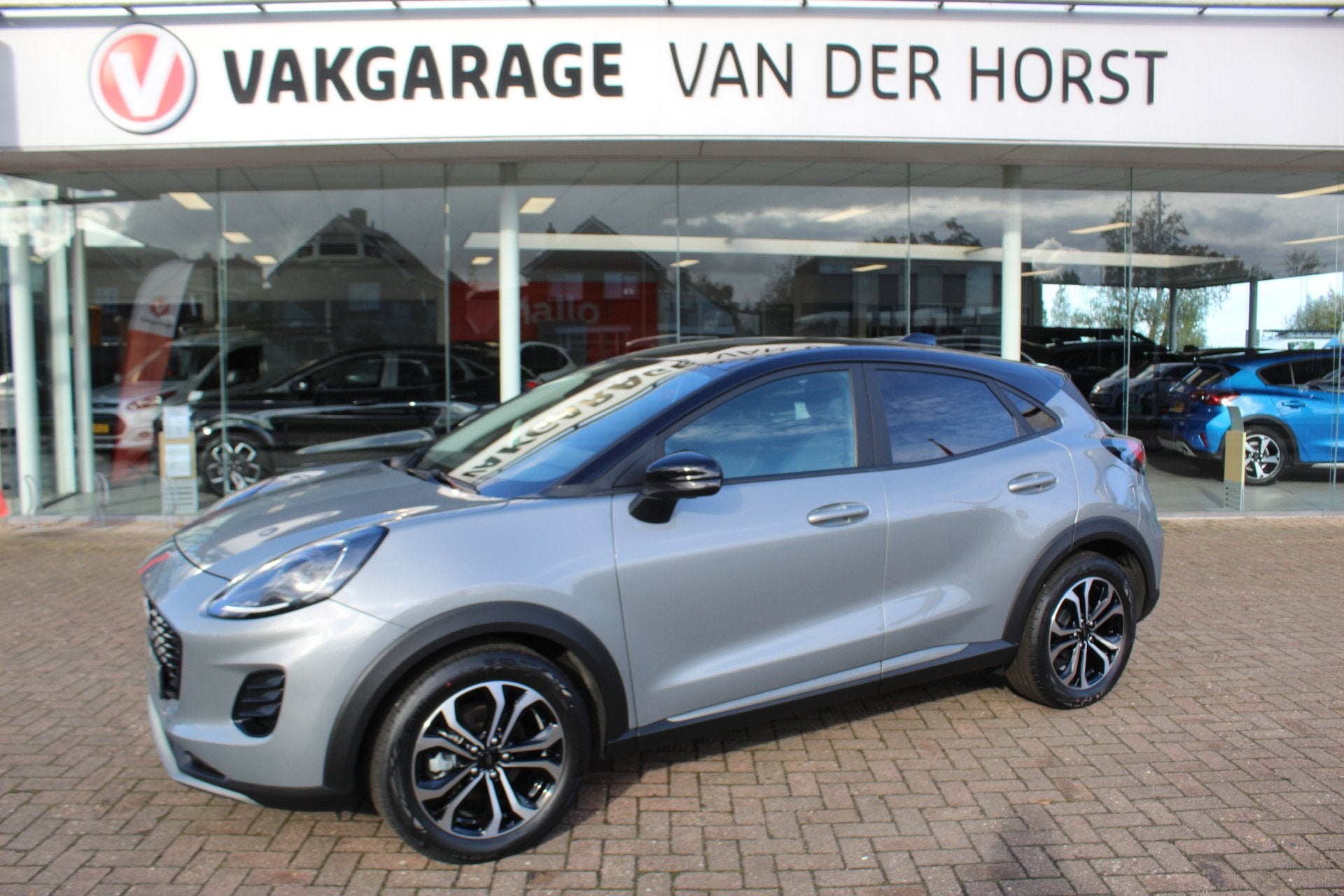 Ford Puma 1.0-125pk EcoBoost Hybrid Titanium Nieuw Model Nav, Auto's, Ford, Stof, Zwart, 24 maanden, Origineel Nederlands