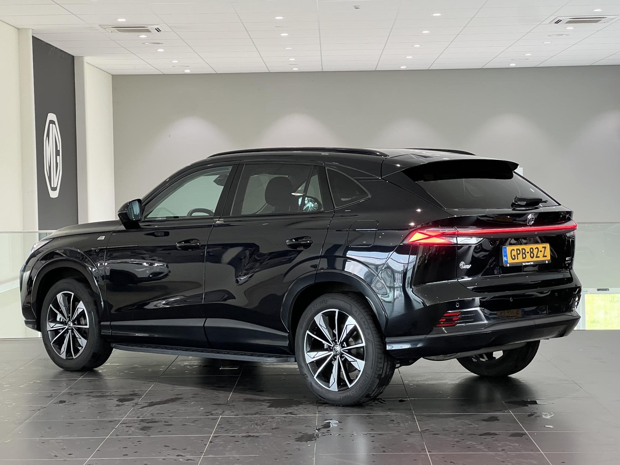 MG HS PHEV 1.5 272pk Aut. Luxury | 100km Electrisch | Navi |, Auto's, MG, 12 maanden, Stof, Automatische klimaatregeling, 4 cilinders