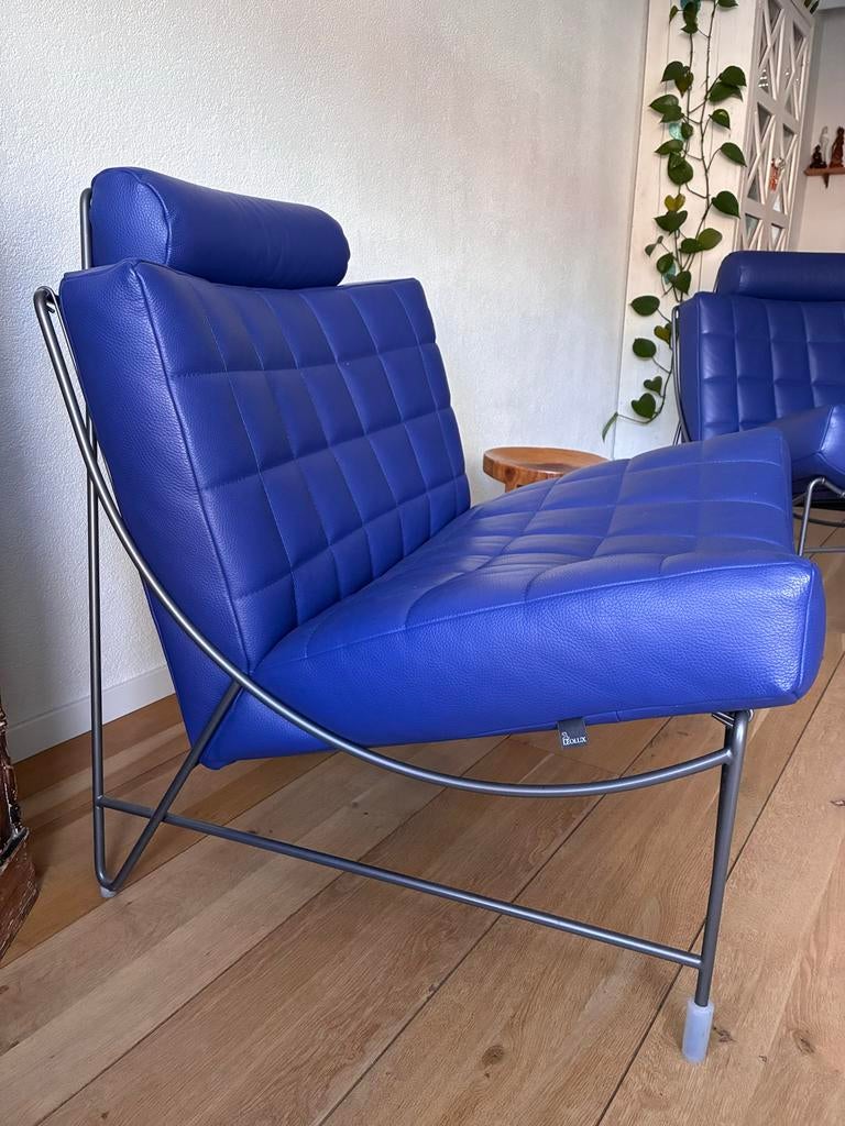 Leolux Volare Fautuils (2) met hocker - Blauw Leer, Huis en Inrichting, Fauteuils, Ophalen of Verzenden, Zo goed als nieuw, Leer