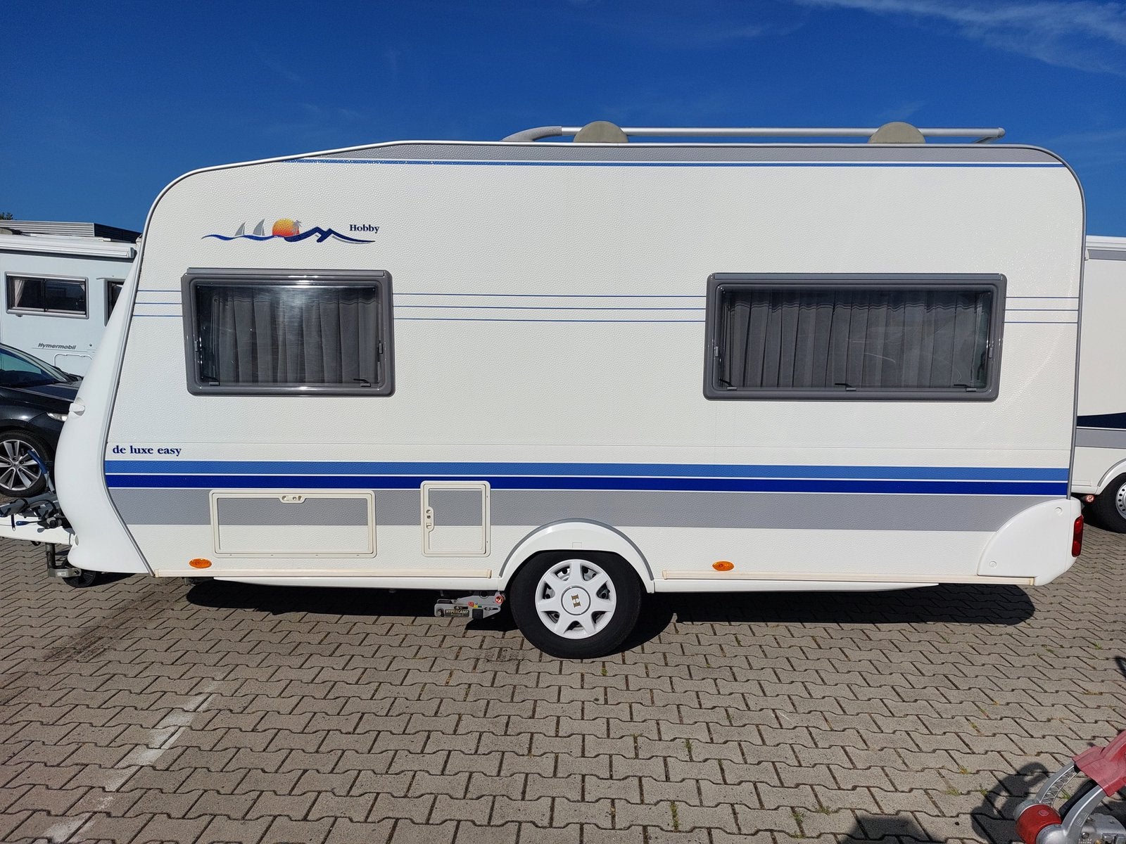 Hobby De Luxe Easy 440 SF - Complete caravan met voortent, Caravans en Kamperen, Schokbreker, Hobby, Treinzit, Dwarsbed