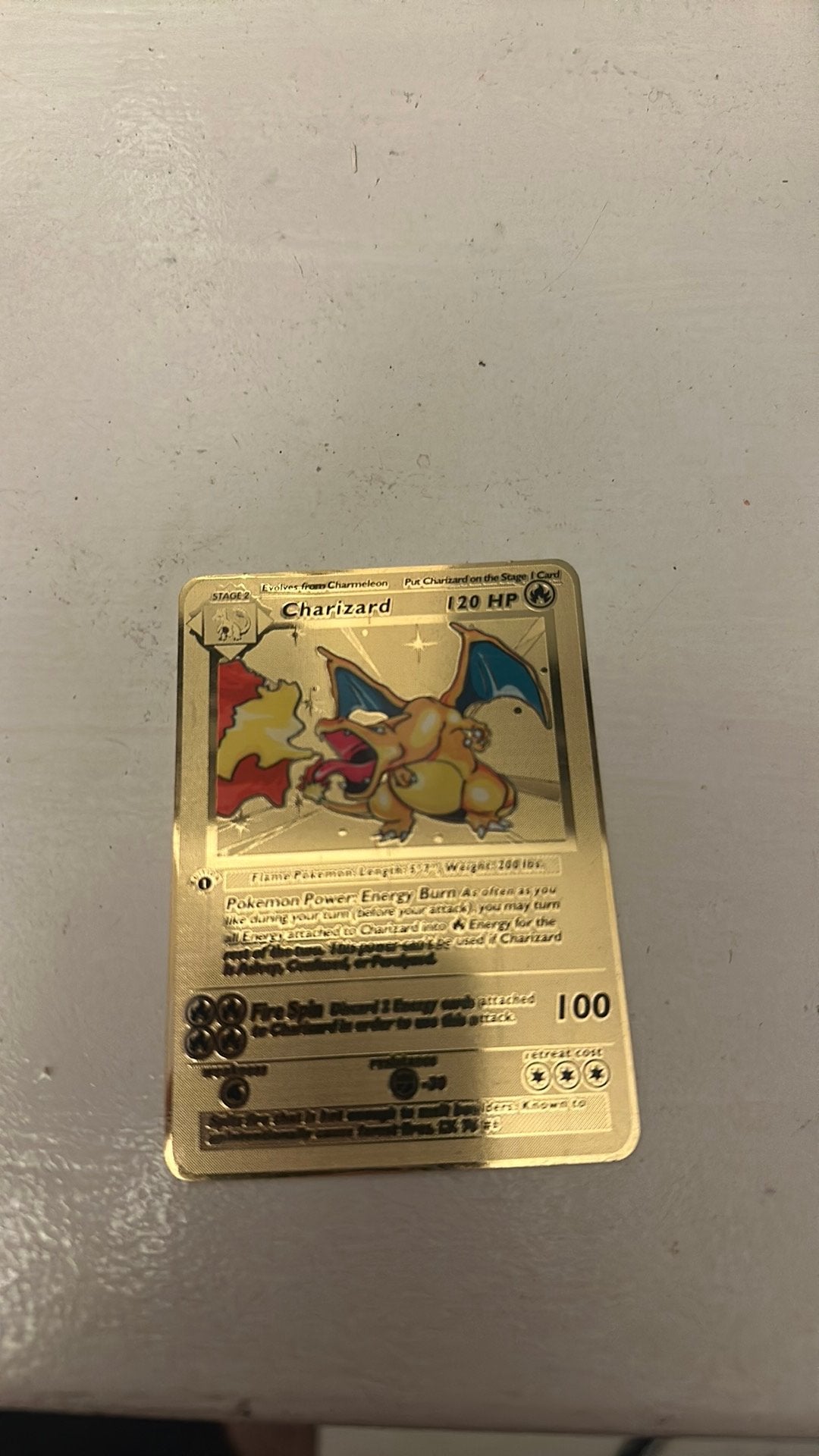 First Edition Charizard metal card, Ophalen of Verzenden, Nieuw, Losse kaart, Foil