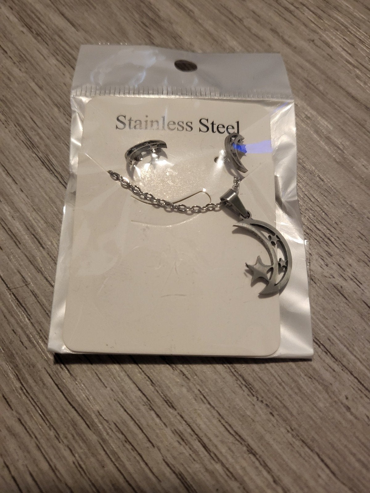 Nieuwe RVS ketting met maan en ster hanger, Nieuw, Ophalen of Verzenden, Zilver, Overige materialen