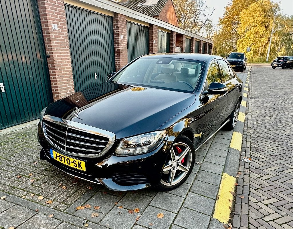 Mercedes-Benz C-Klasse C180 1.6 115KW Aut7 2014 Zwart, Auto's, Automaat, 1800 kg, Zwart, 1595 cc