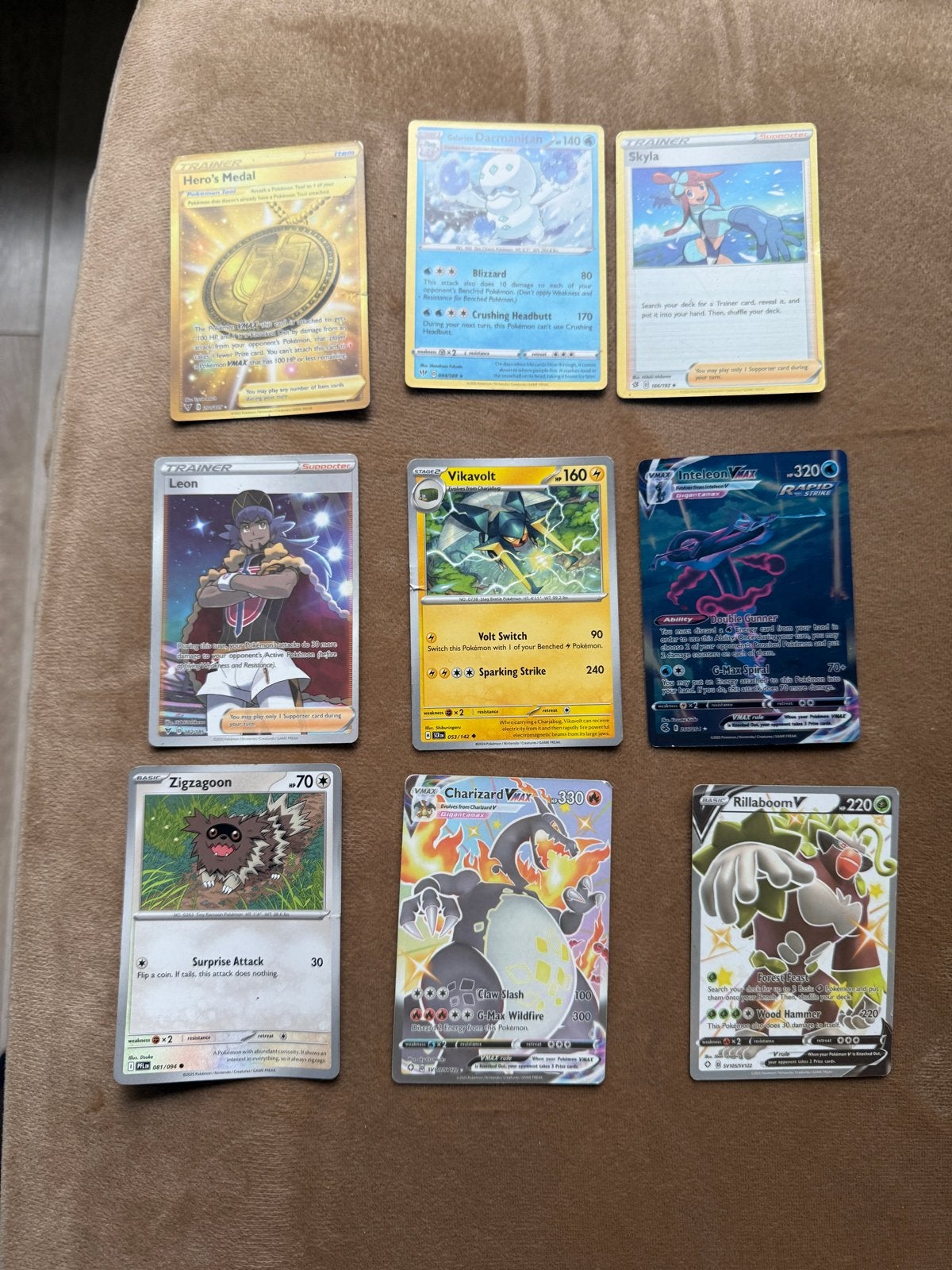 Pokémon Kaarten Collectie - Charizard VMAX, Skyla, Leon, Hobby en Vrije tijd, Ophalen of Verzenden, Zo goed als nieuw, Meerdere kaarten