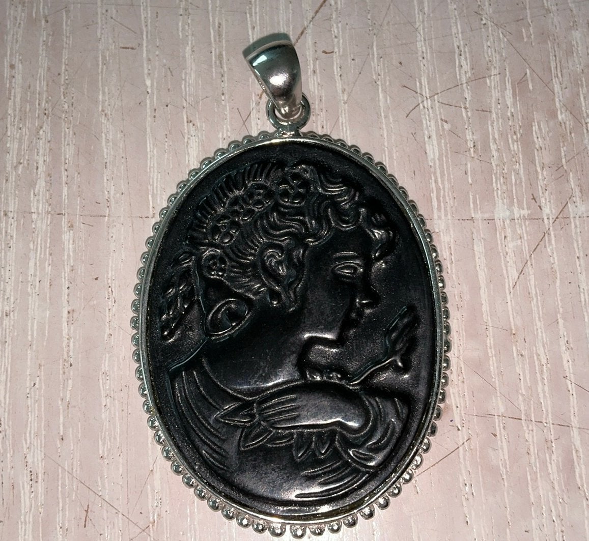 zwarte camee-hanger met zilveren rand, Ophalen of Verzenden, Zo goed als nieuw, Zilver, Overige materialen