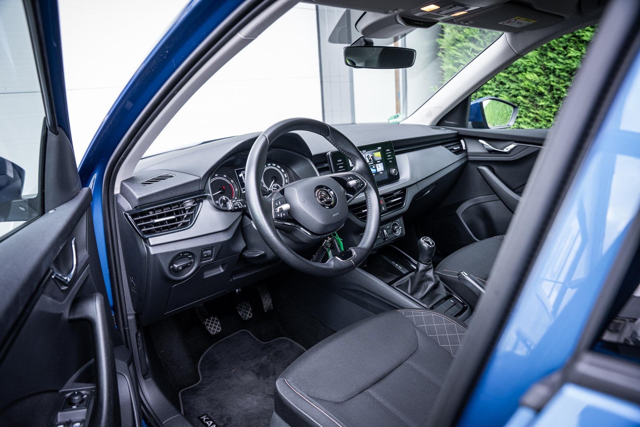 Skoda Kamiq 1.0 TSI Ambition OrgNL|Carplay|Trekhaak|18", Stof, Gebruikt, Blauw, 620 kg