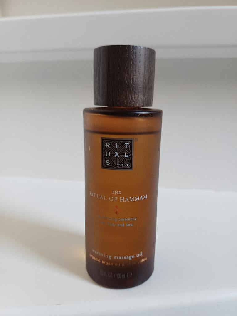RITUALS HAMMAM WARMING MASSAGE OIL100ML(EEN BEETJE ERUIT), Ophalen of Verzenden, Zo goed als nieuw, Bodylotion, Crème of Olie