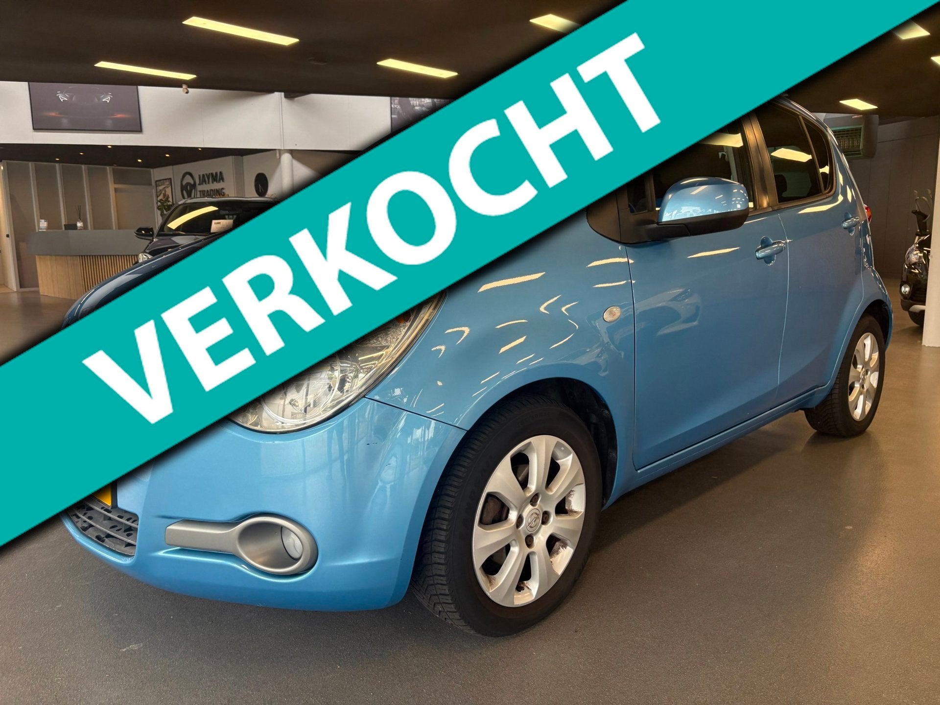 Opel Agila 1.2 Enjoy, Auto's, Voorwielaandrijving, 4 cilinders, Blauw, Origineel Nederlands