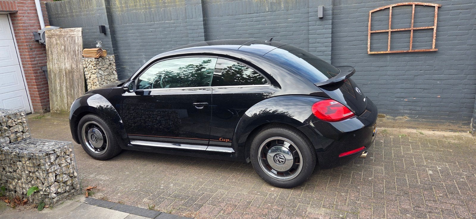 Volkswagen Beetle (Kever) 1.2 TSI 77KW BMT 2015 Zwart, Auto's, Voorwielaandrijving, Beetle (Kever), 4 cilinders, 4 stoelen